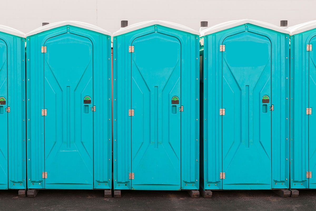 Industrial portable restroom units at a plant in Laramie, Wyoming